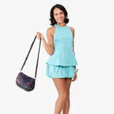 Carnival Large | Model wearing a leather Crossbody with a flap and magnetic closure