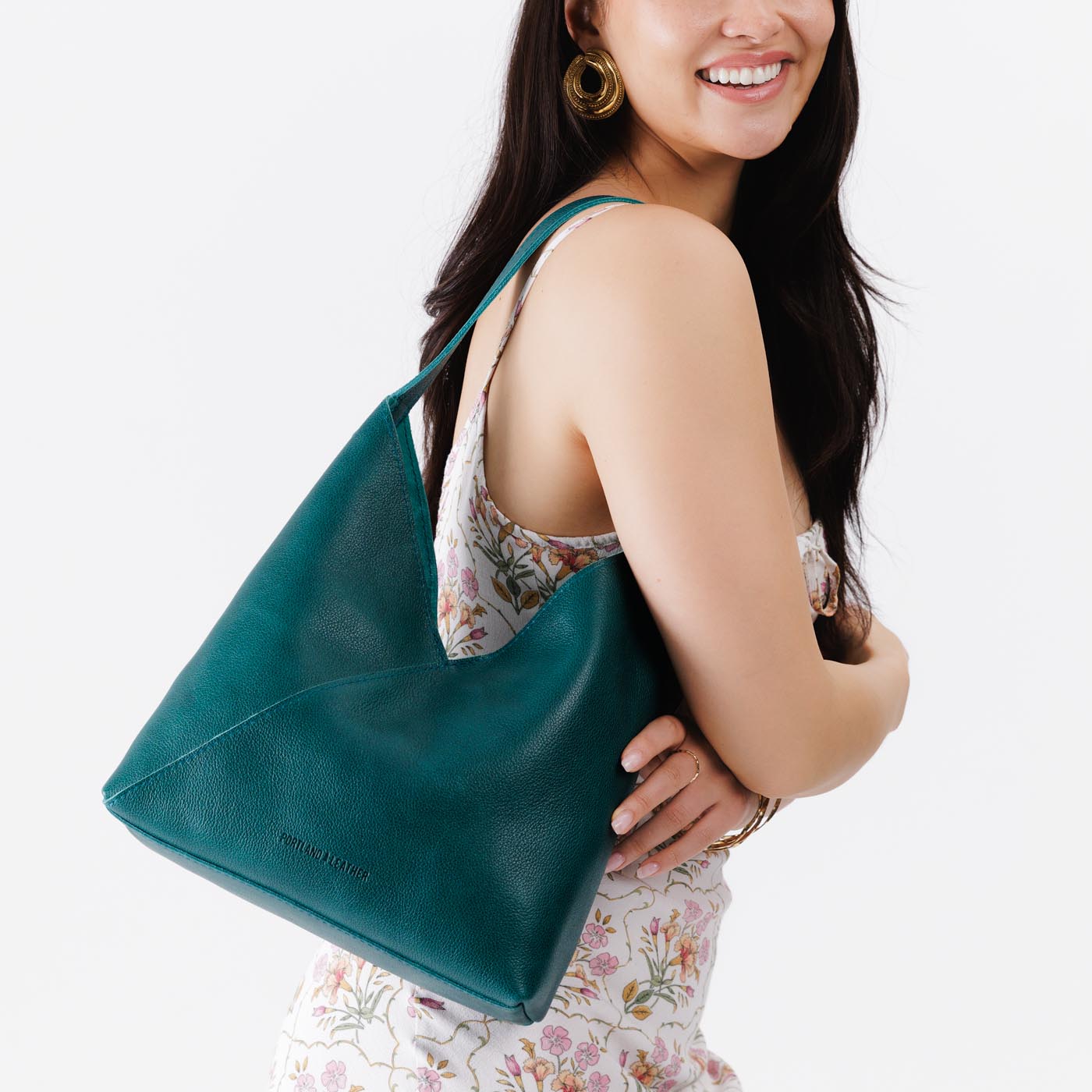 Sea Glass*Large | Model wearing petite shoulder bag with adjustable strap and magnetic snap closure