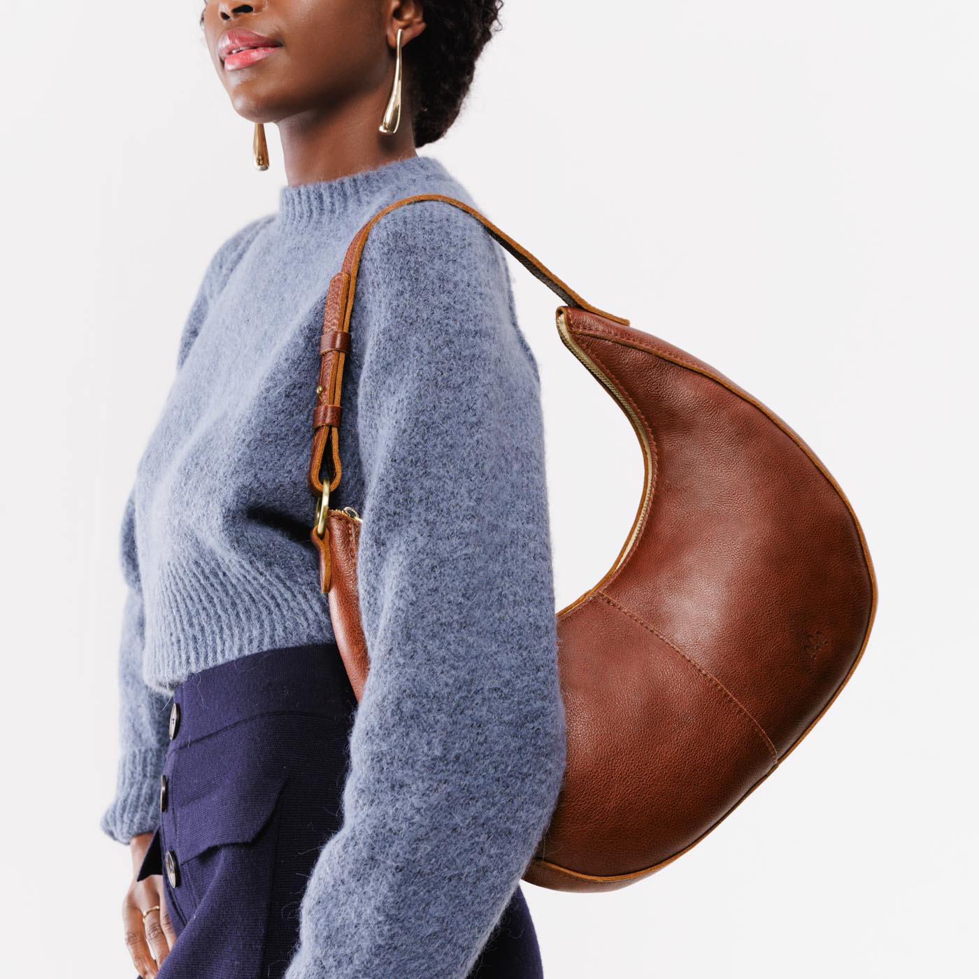 Nutmeg*Large | Large crescent shaped shoulder bag with zipper closure and adjustable strap