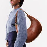 Nutmeg Large | Large crescent shaped shoulder bag with zipper closure and adjustable strap
