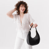 Pebbled--black Large  | Large crescent shaped shoulder bag with zipper closure and adjustable strap