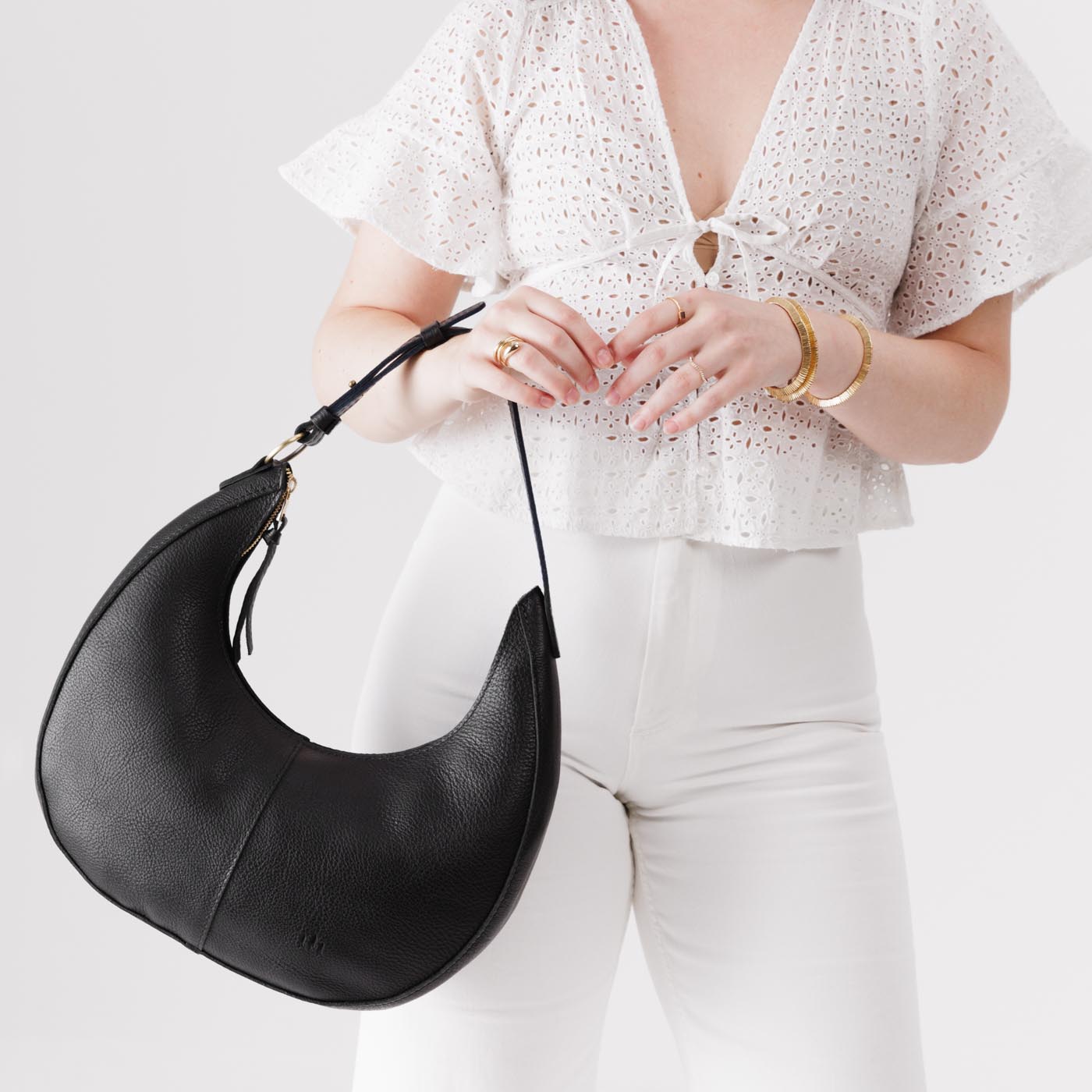 Pebbled--black*Large  | Large crescent shaped shoulder bag with zipper closure and adjustable strap