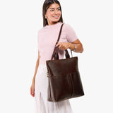 Coldbrew Large | Model wearing a convertible tote clutch crossbody