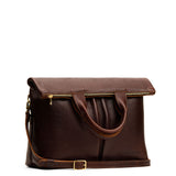 Coldbrew Large | Convertible tote clutch crossbody with two large front pocket and top carry handles folded into a clutch