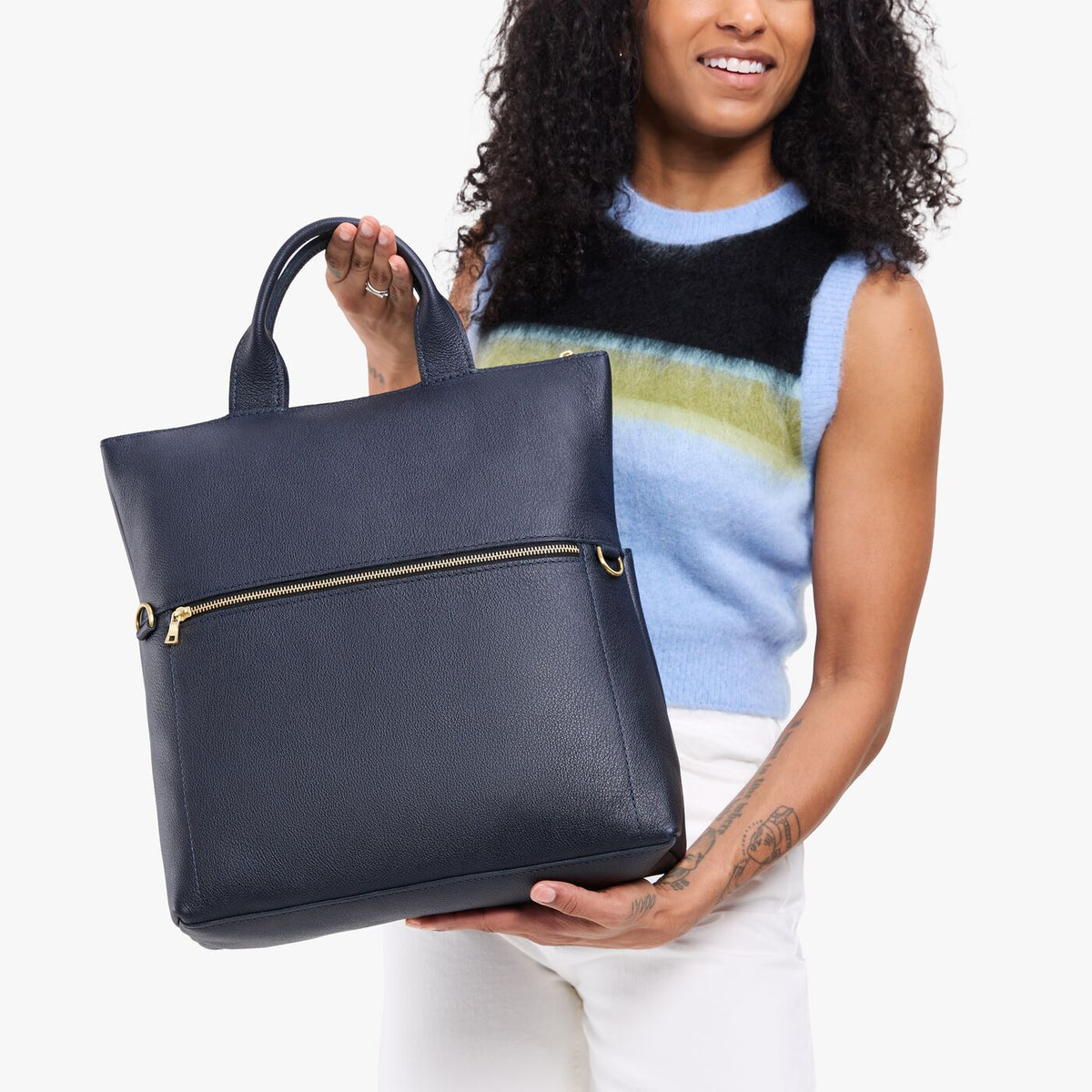 Night Owl*Large | Model wearing a convertible tote clutch crossbody