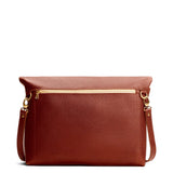 Nutmeg Large | Convertible tote clutch crossbody with a back zipper pocket folded into a clutch