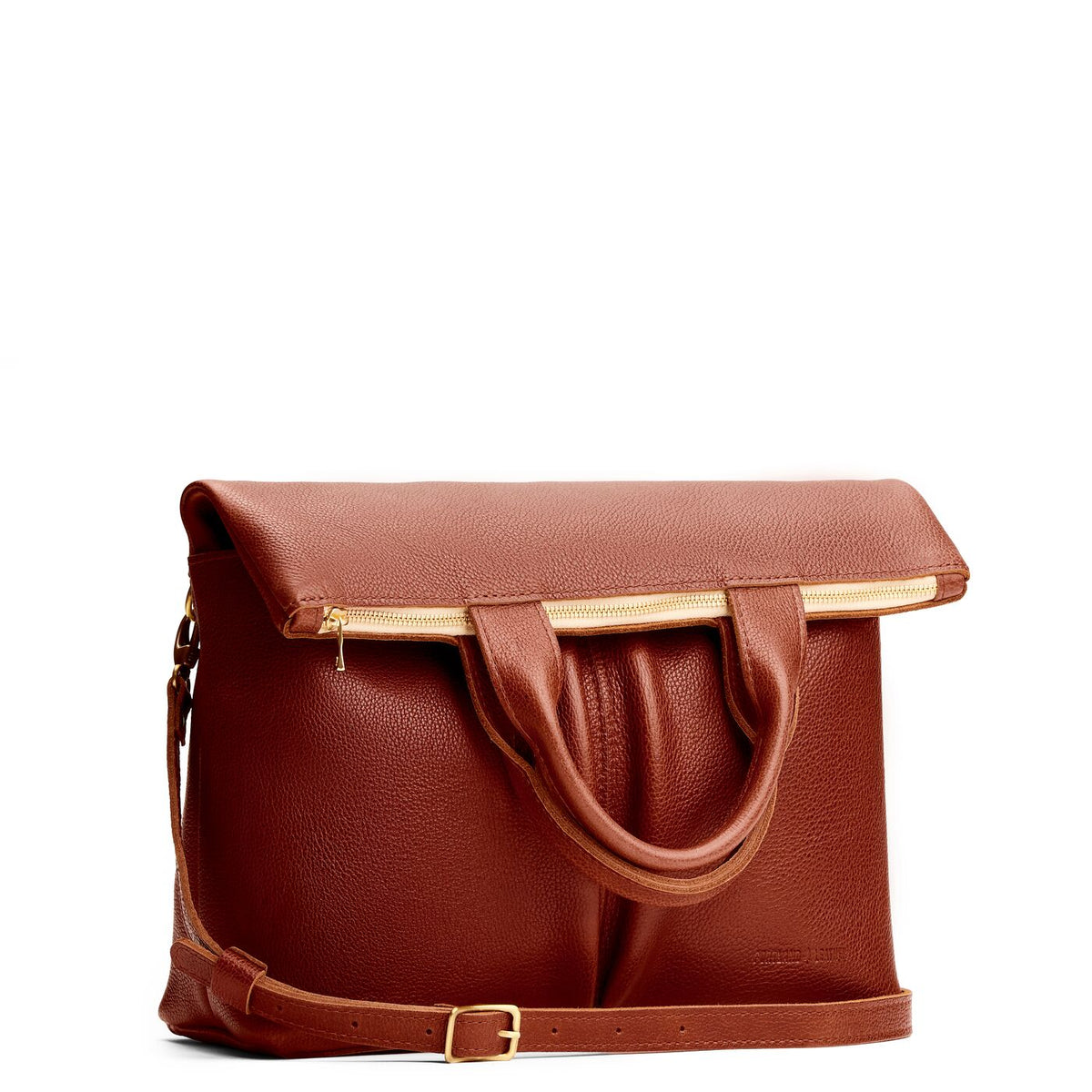 Nutmeg*Large  | Convertible tote clutch crossbody with two large front pocket and top carry handles folded into a clutch