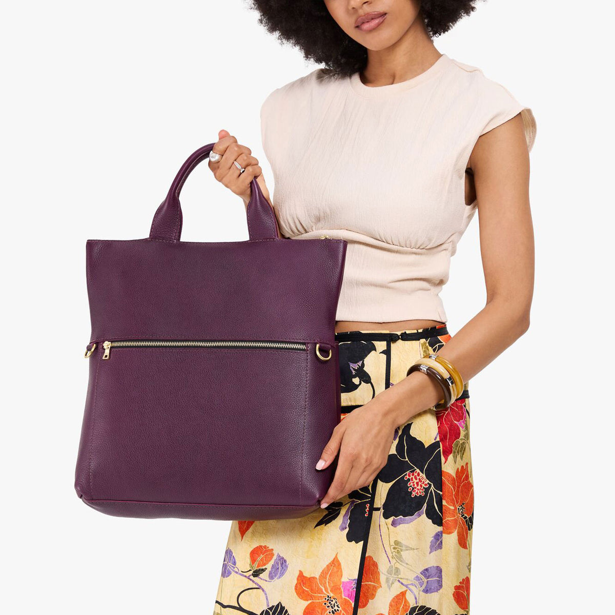 Plum*Large | Model wearing a convertible tote clutch crossbody
