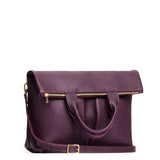 Plum Large | Convertible tote clutch crossbody with two large front pocket and top carry handles folded into a clutch