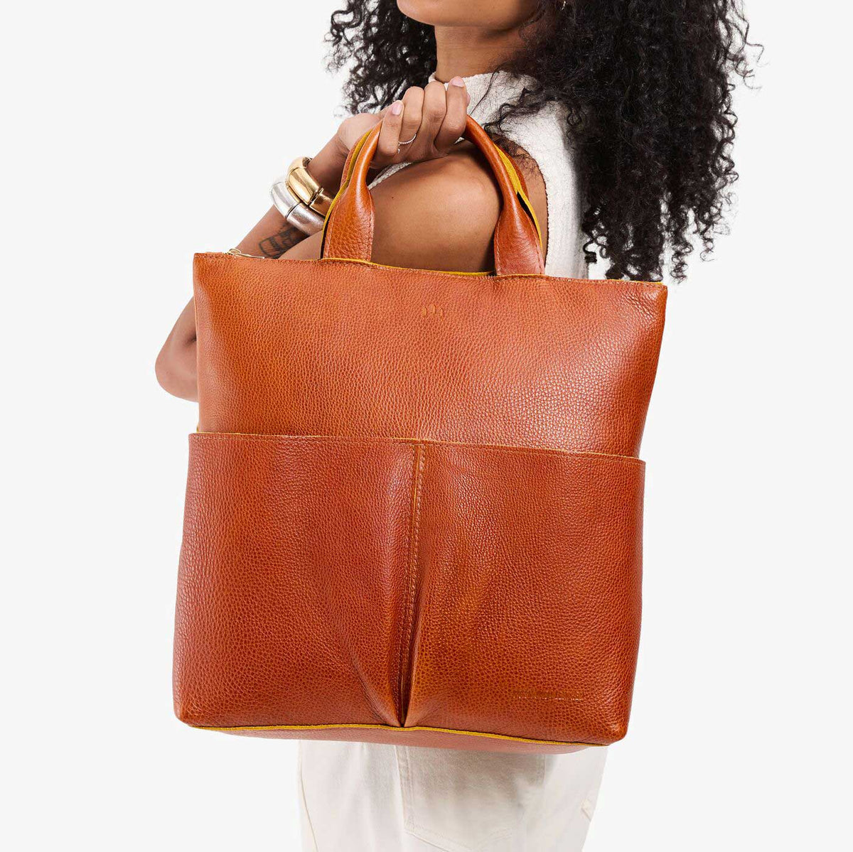 Sienna*Large | Model wearing a convertible tote clutch crossbody