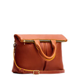 Sienna Large | Convertible tote clutch crossbody with two large front pocket and top carry handles folded into a clutch