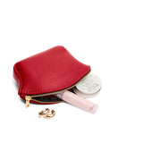 Cherry Large | Seashell shaped leather makeup bag with curved top zipper and flat bottom