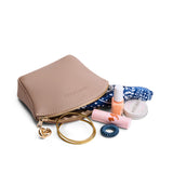 Stone Large | Seashell shaped leather makeup bag with curved top zipper and flat bottom