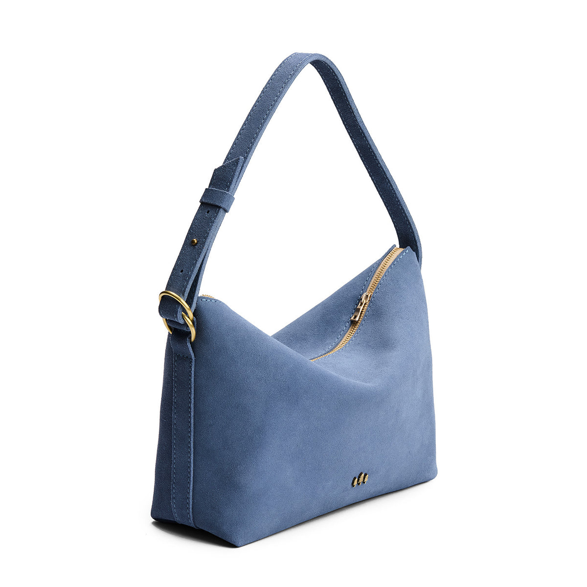 Denim*Large | Slouchy Shoulder Bag that has a zipper opening and three metal tree emblems on a white background