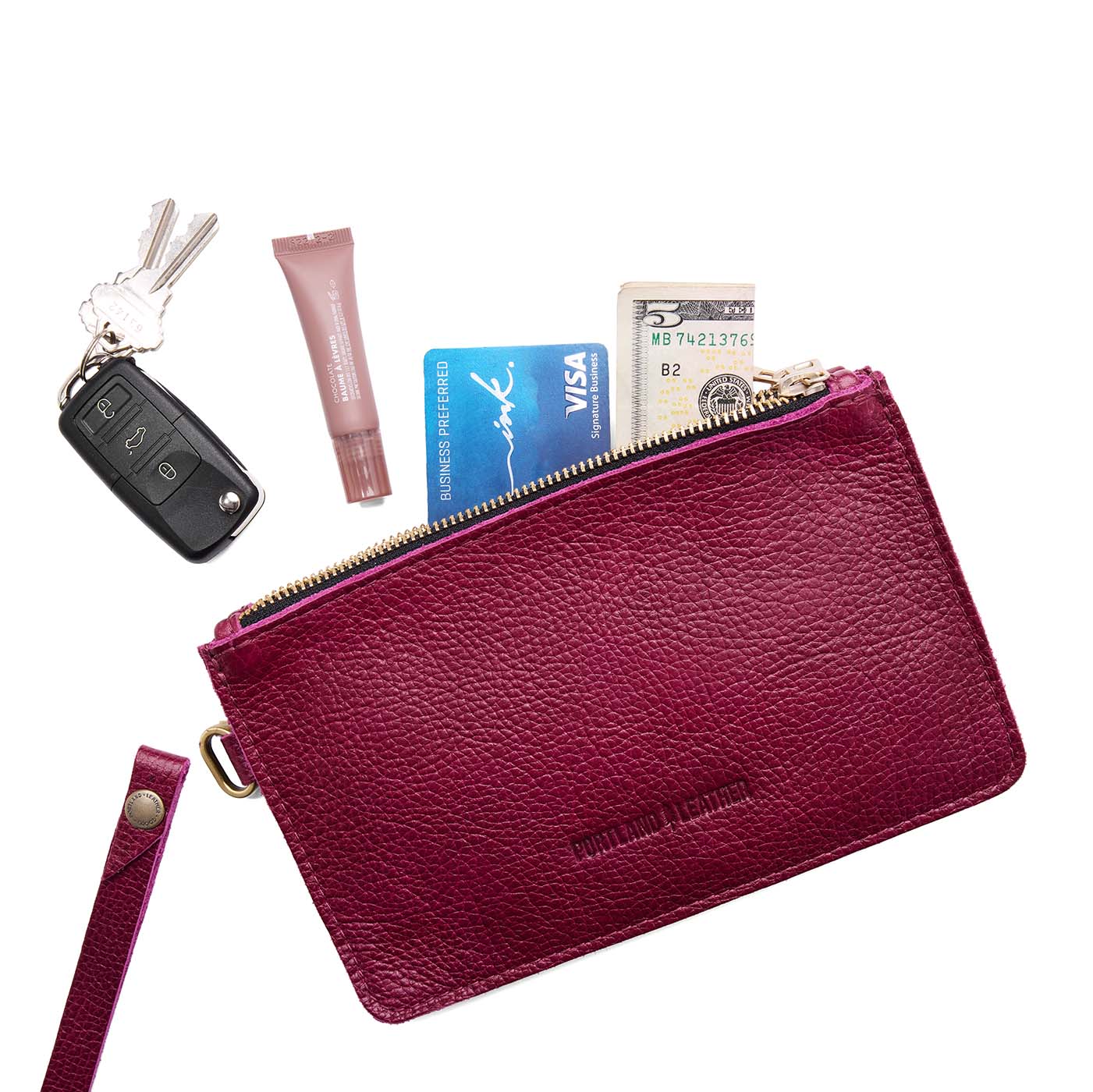 Orchid | Leather wristlet with two zippered pockets and removable wrist strap