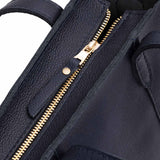 Night Owl Zipper | Structured mid-size tote bag with overlapping panels and crossbody strap
