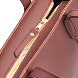 Sunkissed Zipper | Structured mid-size tote bag with overlapping panels and crossbody strap