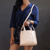 Moonflower | Structured mid-size tote bag with overlapping panels and crossbody strap