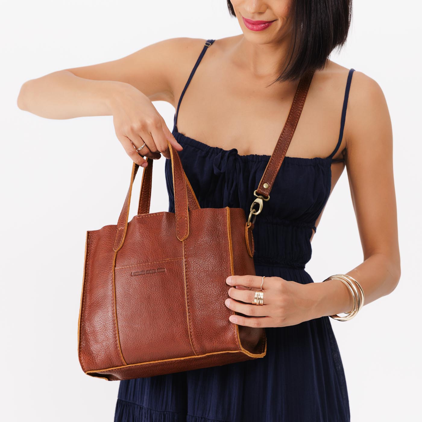 Nutmeg | Structured mid-size tote bag with overlapping panels and crossbody strap