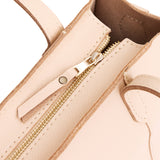 Moonflower Zipper | Structured mid-size tote bag with overlapping panels and crossbody strap