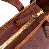 Nutmeg Zipper | Structured mid-size tote bag with overlapping panels and crossbody strap