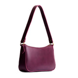 Lollipop | Petite bean shaped shoulder bag with a zipper closure