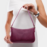 Lollipop | Petite bean shaped shoulder bag with a zipper closure