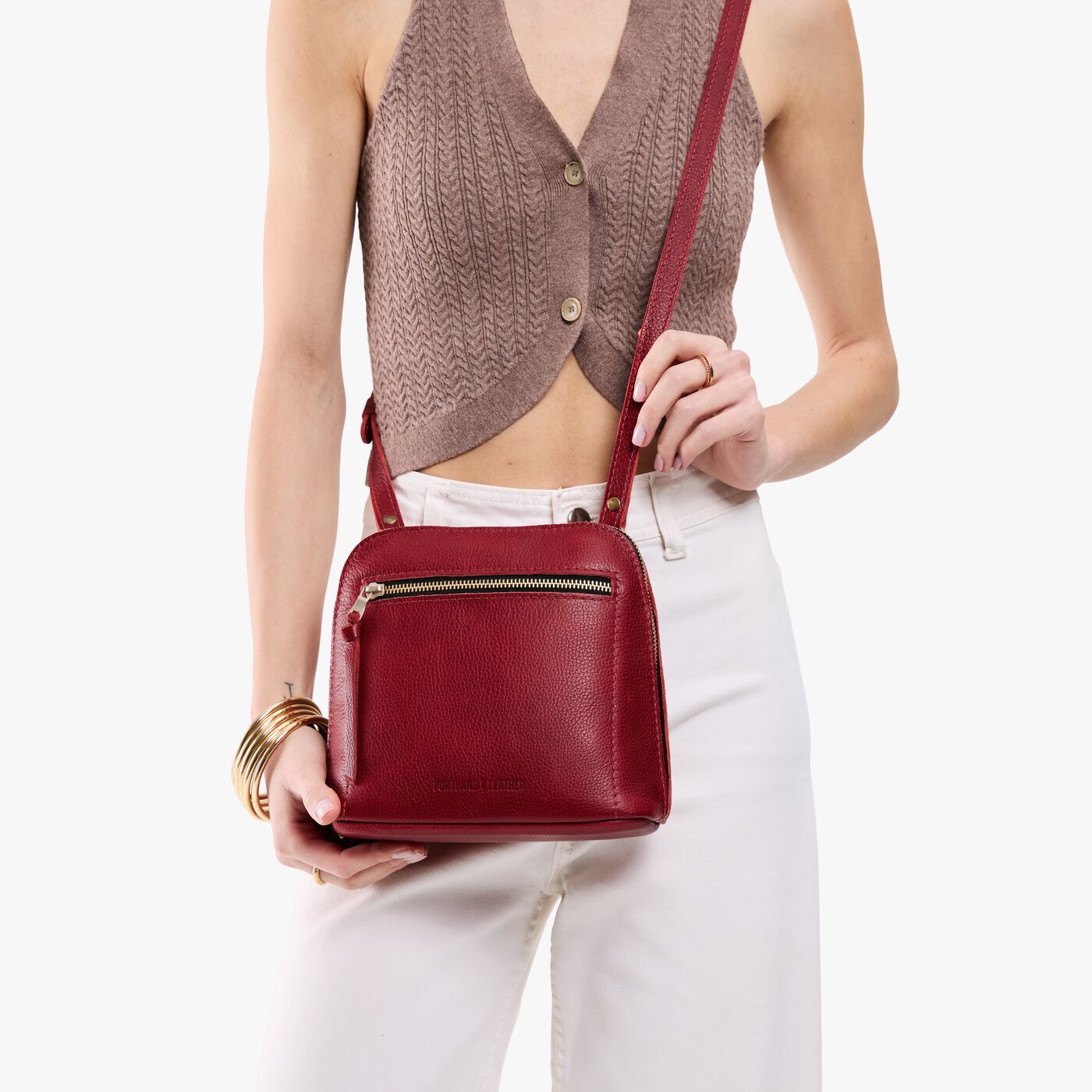 All Variants | A model wearing a Medium luna Crossbody