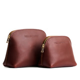 Cognac | Comparison view of compact leather pouches with top zippers