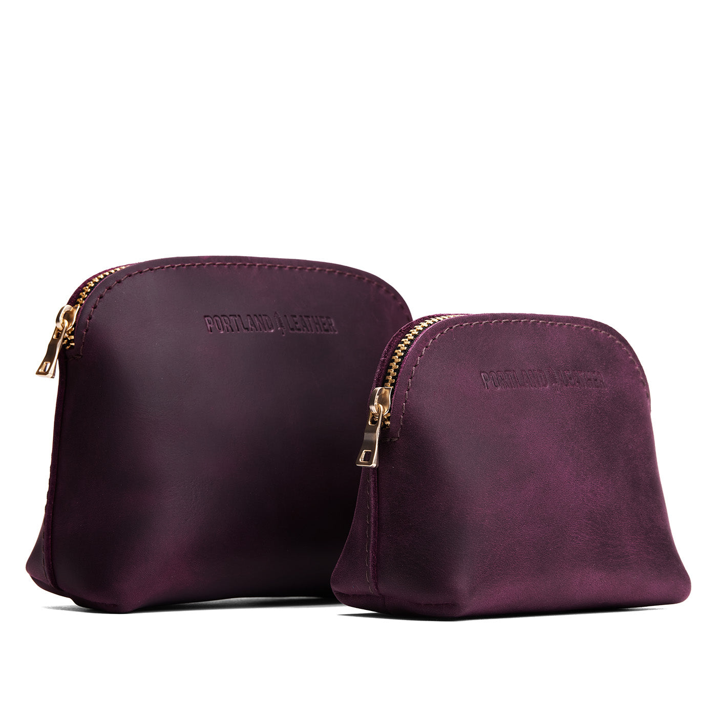 Larkspur | Comparison view of compact leather pouches with top zippers