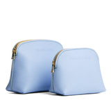 Skyway | Comparison view of compact leather pouches with top zippers