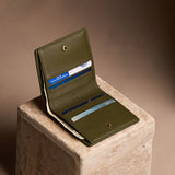 Bay Green Small | Petite slim leather bifold wallet with multiple card slots and a zippered back pocket
