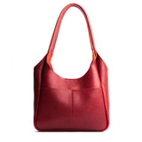 Chili Red Large | U-shaped, flat-bottomed leather shoulder bag with two outside pockets