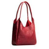 Chili Red Large | U-shaped, flat-bottomed leather shoulder bag with two outside pockets