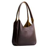 Coldbrew Large | U-shaped, flat-bottomed leather shoulder bag with two outside pockets