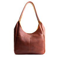 Nutmeg*Large | U-shaped, flat-bottomed leather shoulder bag with two outside pockets