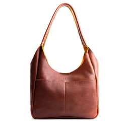 Nutmeg*Large | U-shaped, flat-bottomed leather shoulder bag with two outside pockets