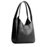 Pebbled--Black Large | U-shaped, flat-bottomed leather shoulder bag with two outside pockets