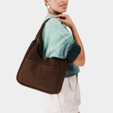 Stagecoach Large | U-shaped, flat-bottomed leather shoulder bag with two outside pockets