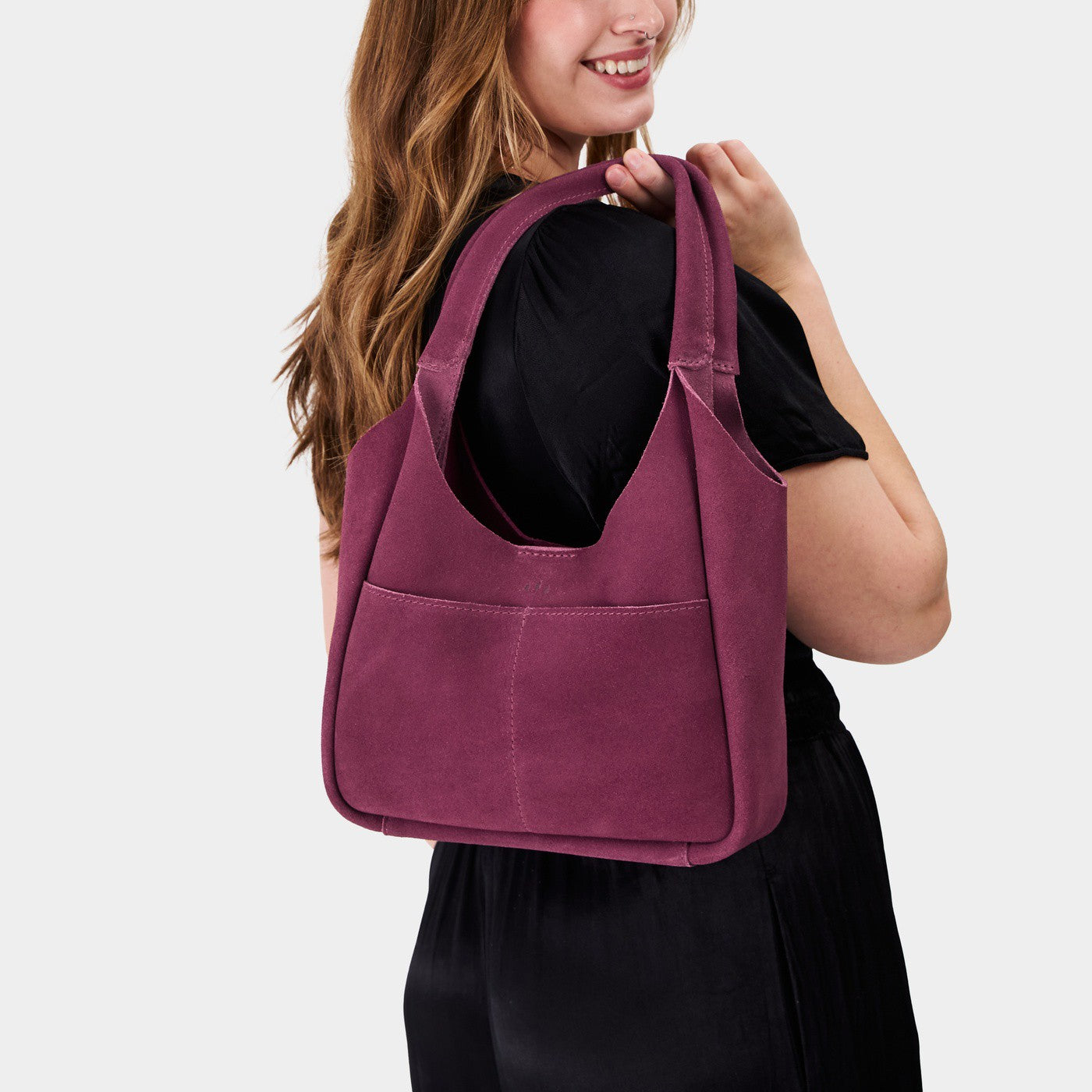 All Variants | Model carrying Madison Shoulder Bag in the color Bloom