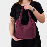 Superbloom Large | U-shaped, flat-bottomed leather shoulder bag with two outside pockets