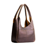 Coldbrew Medium | U-shaped, flat-bottomed leather shoulder bag with two outside pockets