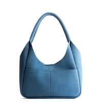 Mariner Blue*Medium | U-shaped, flat-bottomed leather shoulder bag with two outside pockets