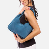 Mariner Blue Medium | U-shaped, flat-bottomed leather shoulder bag with two outside pockets