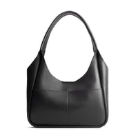 Pebbled--Black*Medium | U-shaped, flat-bottomed leather shoulder bag with two outside pockets