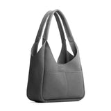 Smoke Grey Medium | U-shaped, flat-bottomed leather shoulder bag with two outside pockets