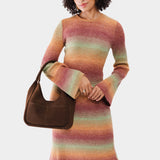 Stagecoach Medium | U-shaped, flat-bottomed leather shoulder bag with two outside pockets