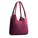 Superbloom Large | U-shaped, flat-bottomed leather shoulder bag with two outside pockets