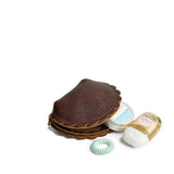 Coldbrew Small | Curved leather pouch with zipper and scalloped edges