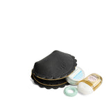 Pebbled--black Small | Curved leather pouch with zipper and scalloped edges